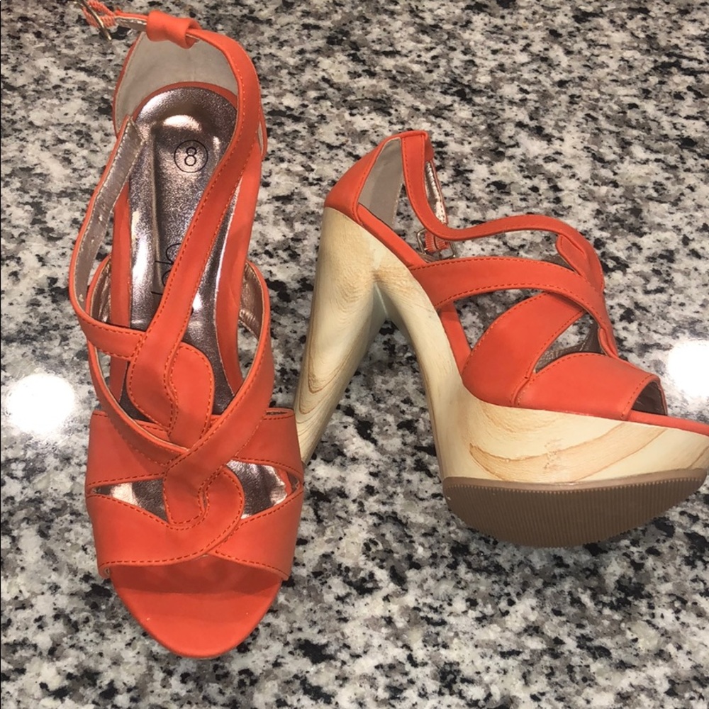 Orange strappy heels